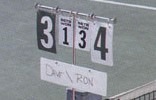 Scoreboard displaying a tennis match with scores: 3 in the first set and 4 in the second. Players listed as Dan vs. Ron.